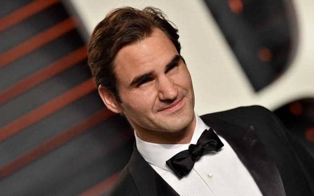 フェデラーが南アフリカのラグビー選手コリシを道案内