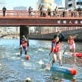 初春の横浜で国際SUPマラソン　国内外から130人がパドルで競う