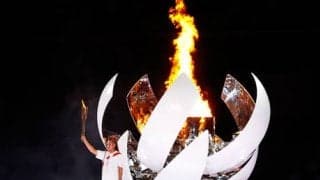  大坂、聖火台に点火「名誉」 