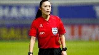 今大会唯一の日本人審判員である山下良美さん、ベルギーvsカナダで第4審を担当