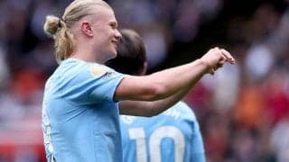 ハーランドに抱きついたファン、実はボクシングの元世界チャンピオンだった！広告看板乗り越え後ろから飛びかかる